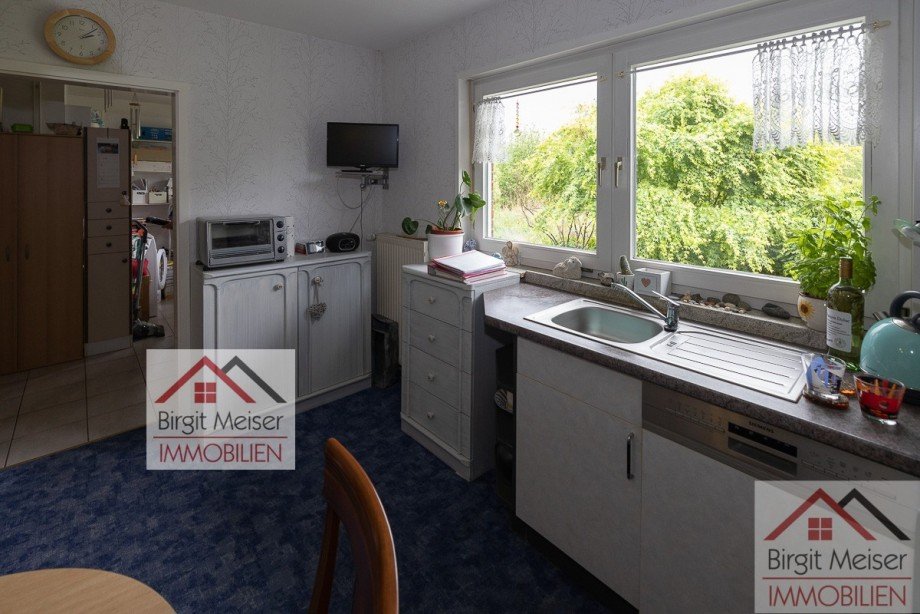K�che mit Blick zum HWR Einfamilienhaus Bollewick